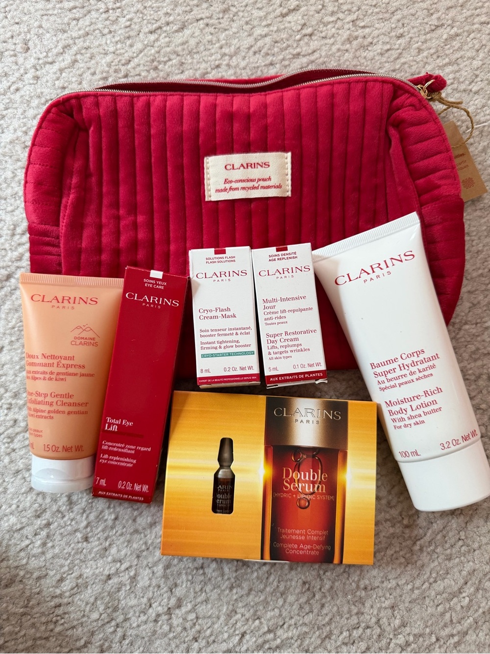 Clarins Pink-Red Quilted Cosmetic Pouch with Skincare Set
